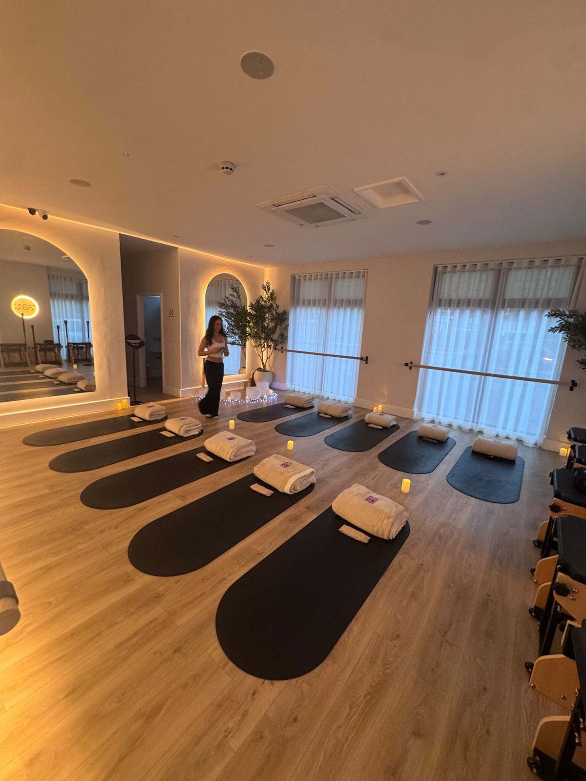 Mats, blankets and candles laid out for a breathwork session